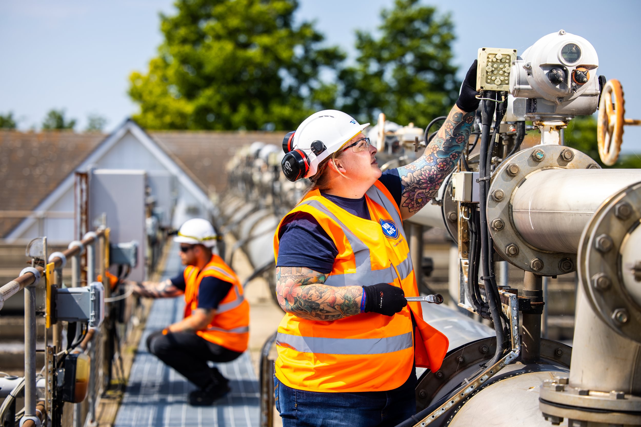 lady fixing equipment at a Southern Water site 
                        