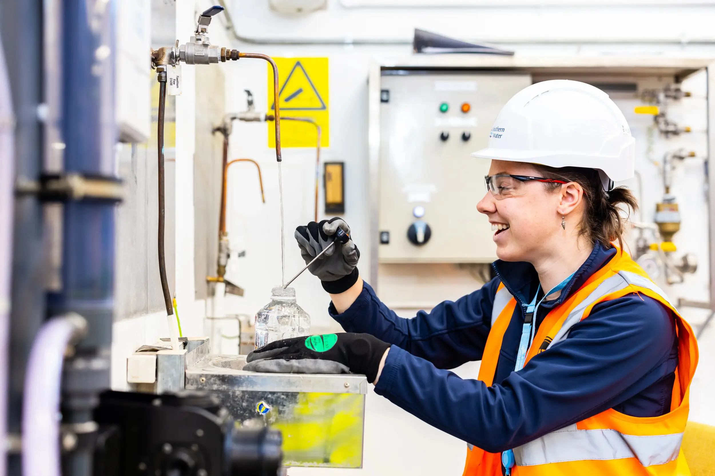 young lady working in a Southern Water lab