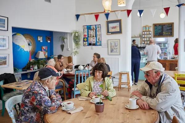 People in a community centre supported by Southern Water